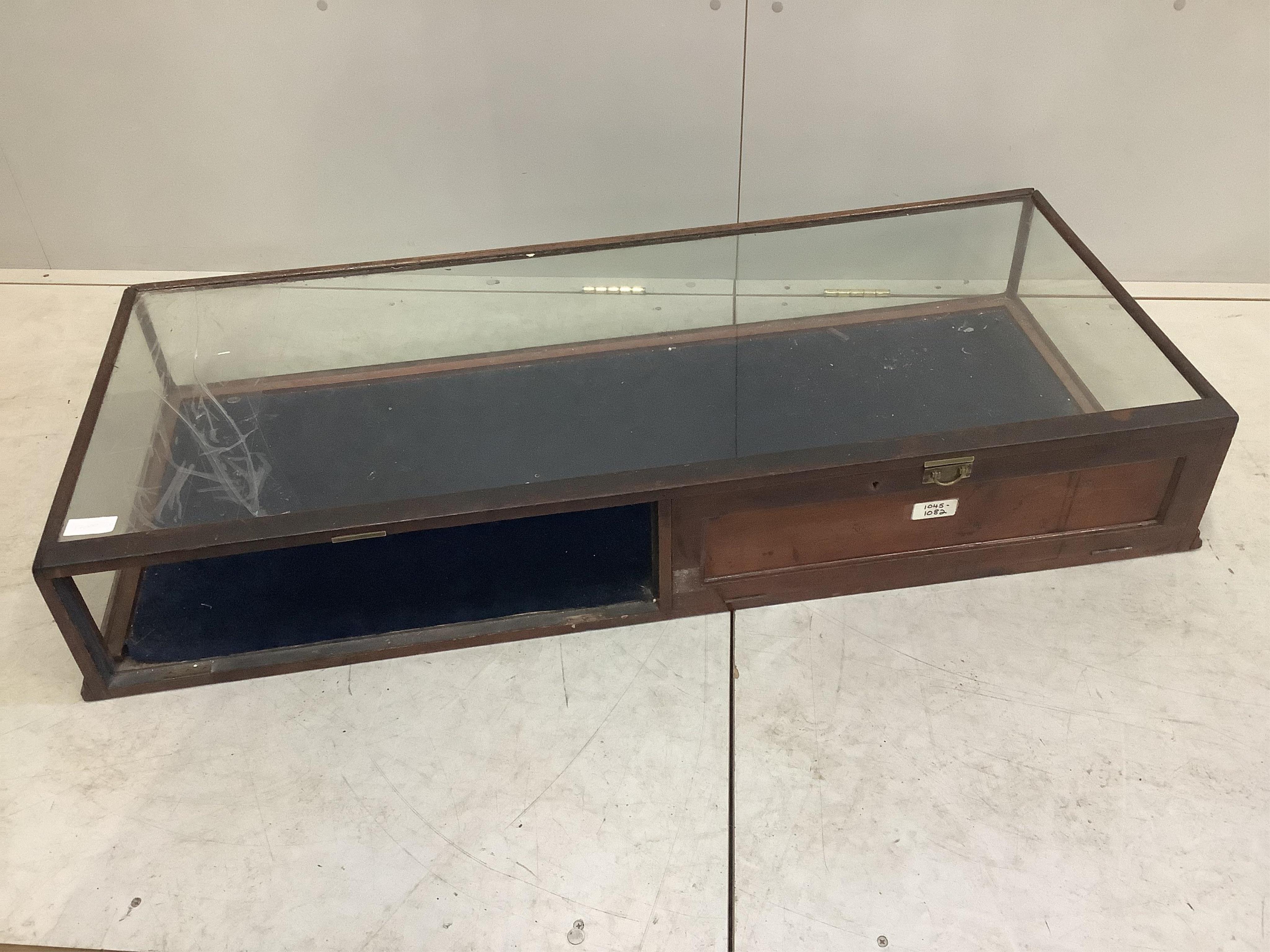 Two late 19th / early 20th century mahogany table top display cases, larger width 151cm, depth 61cm, height 25cm. Condition - poor